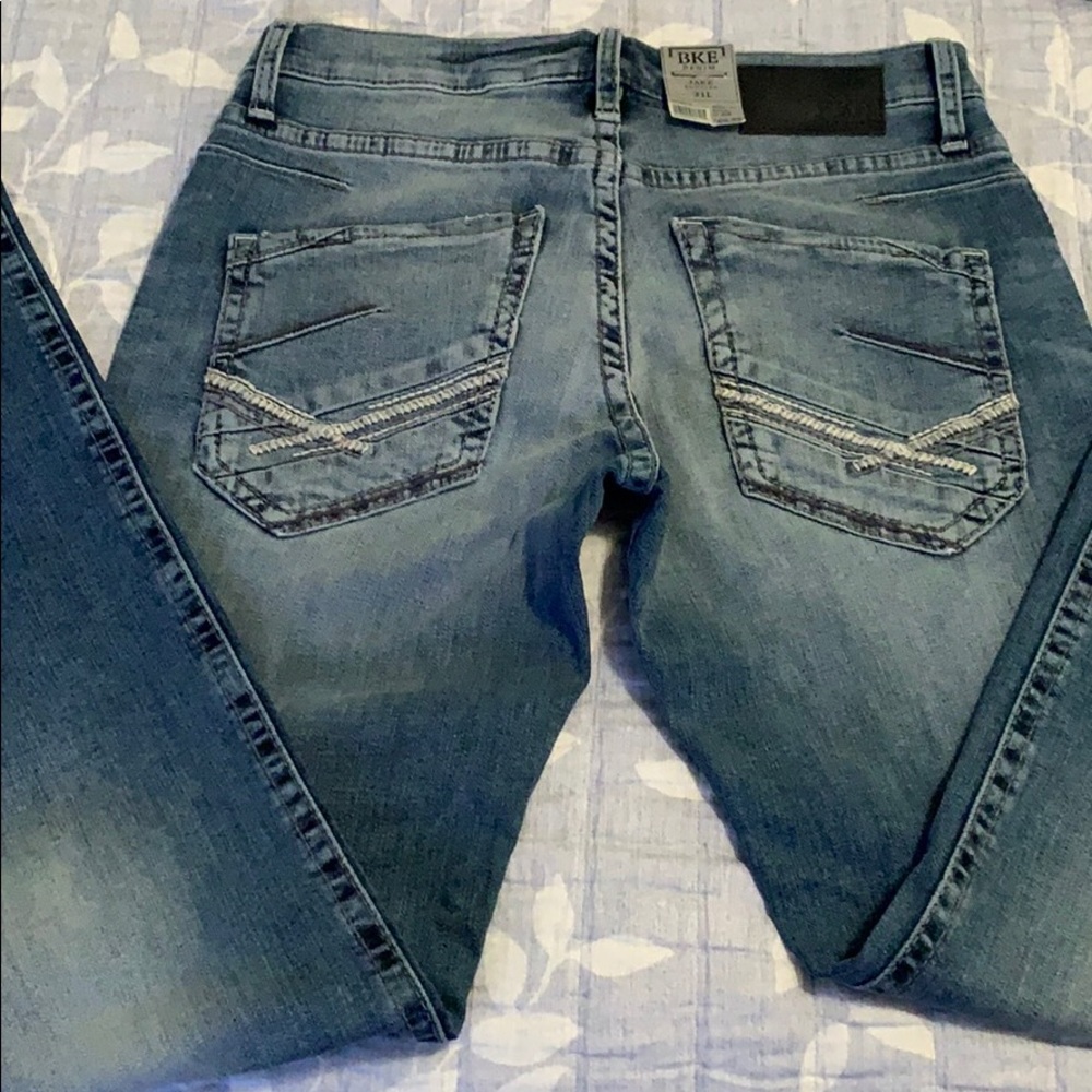 Buckle Men’s “Jake” Bootcut Medium Wash Jeans